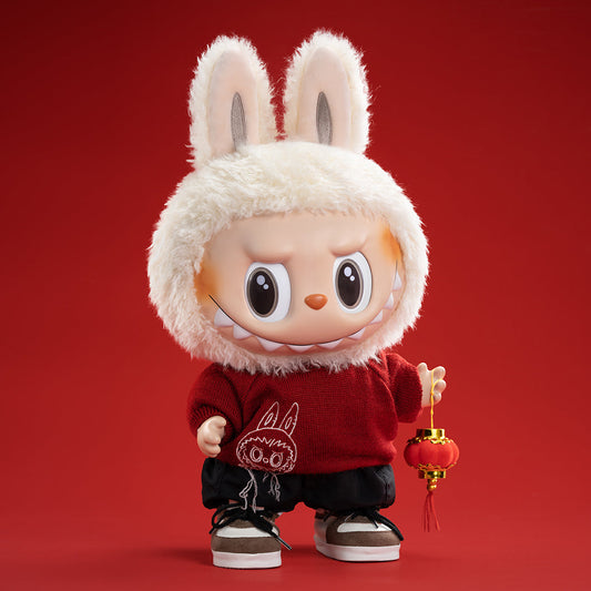 Poupée en peluche en vinyle « Bonne chance »